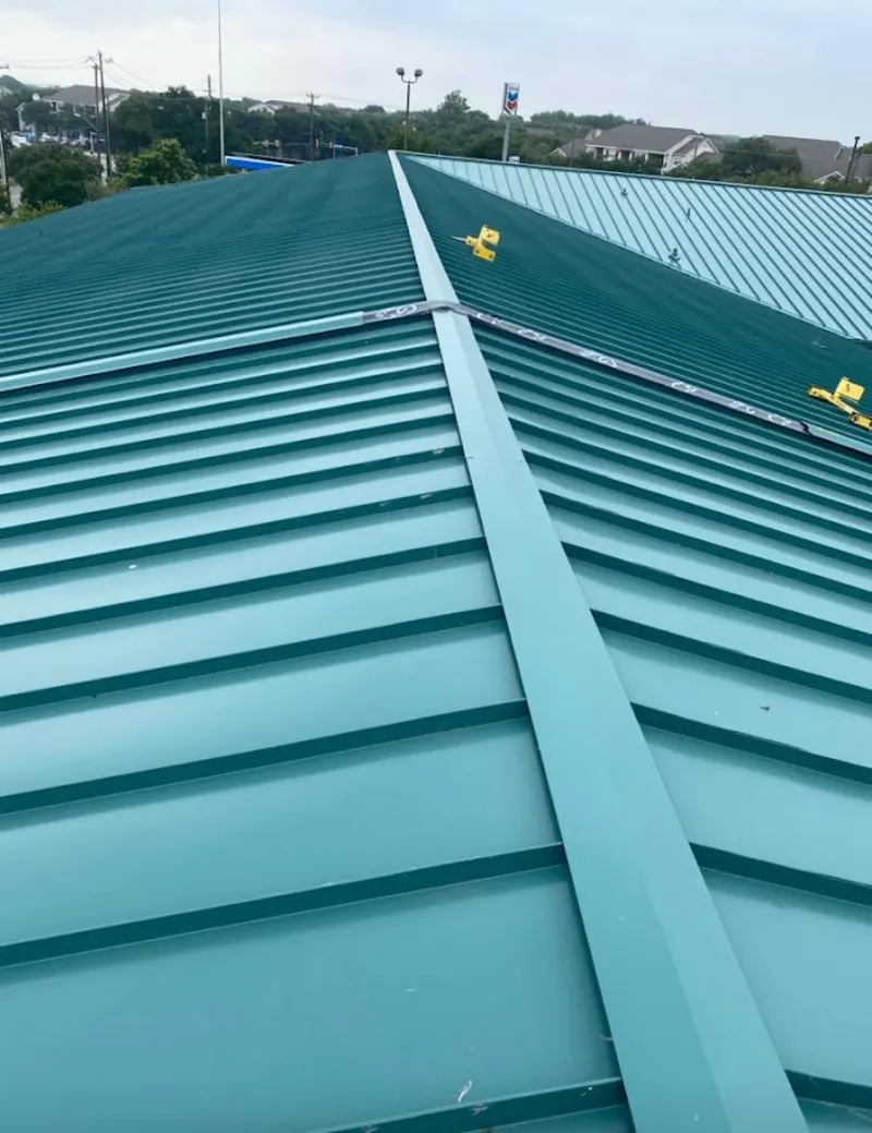 Green commercial metal roof ridge and valley for Metal Roof Repair in Salisbury
